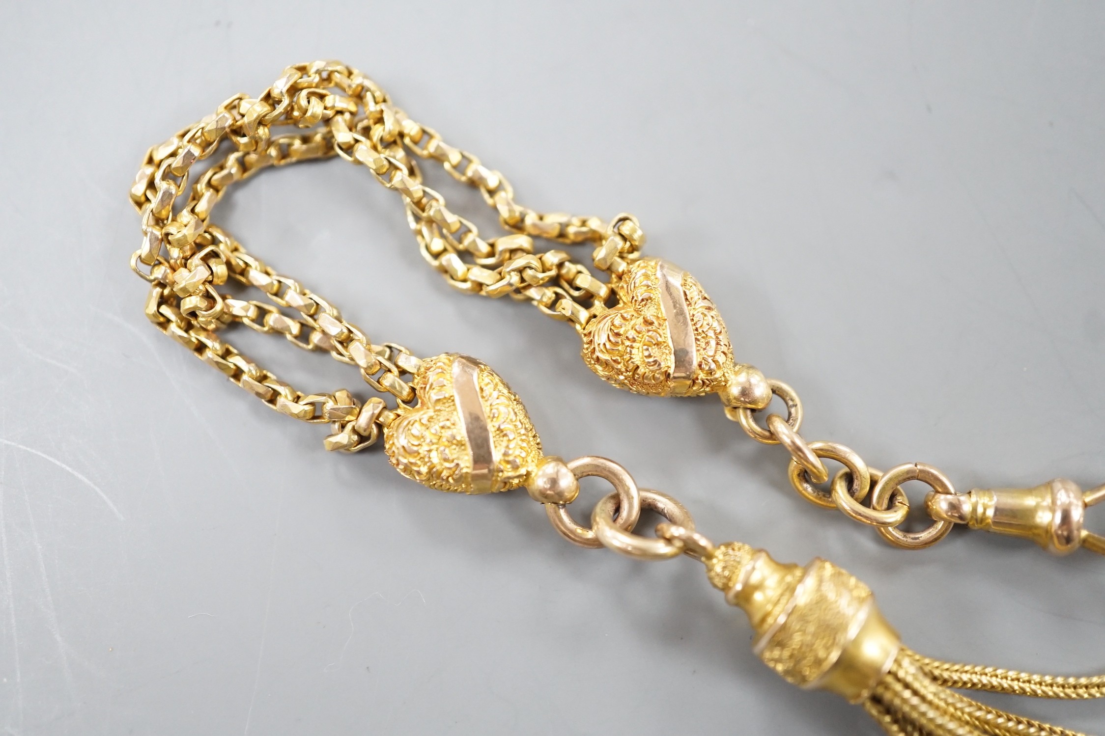 A 9c fob chain, with heart shaped motifs and tassel drop, 15cm, 8.2 grams.